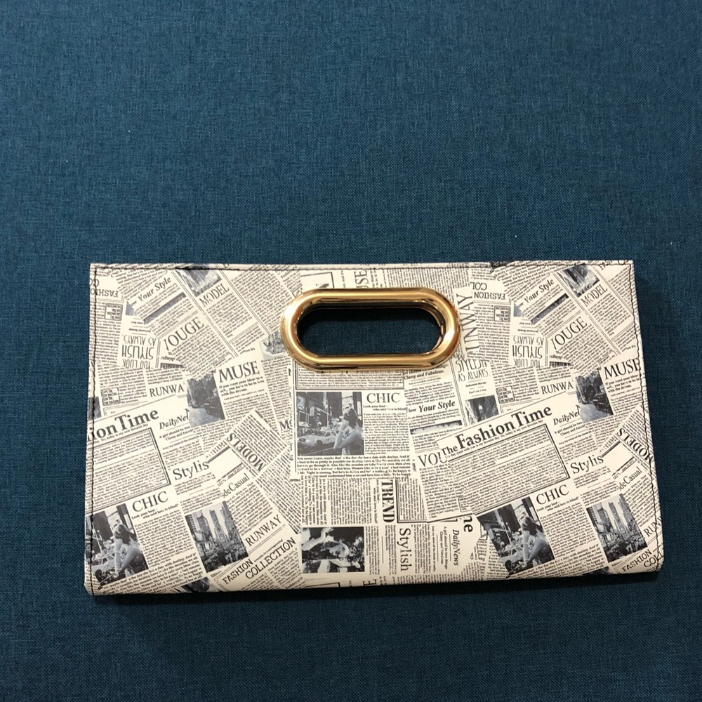 Newspaper print clutch